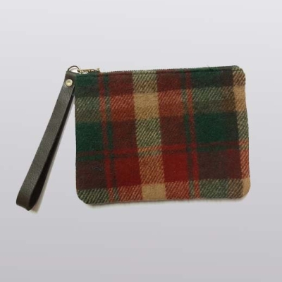 red, green, and gold tartan clutch